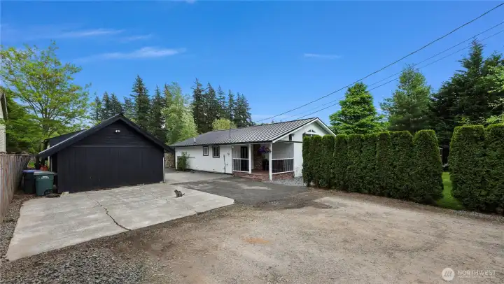 Plenty of space to expand, detached garage has been converted into commercial kitchen but can easily be reverted back to single car garage. Driveway and parking area has recently been graded and fresh gravel added