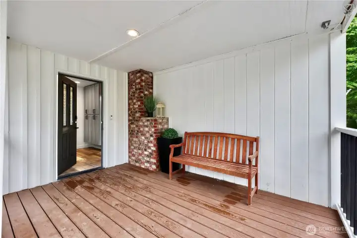 Fully covered front porch welcomes you into your new home, old brick chimney adds charm and decoration to this originally 1929 farmhouse with full remodel