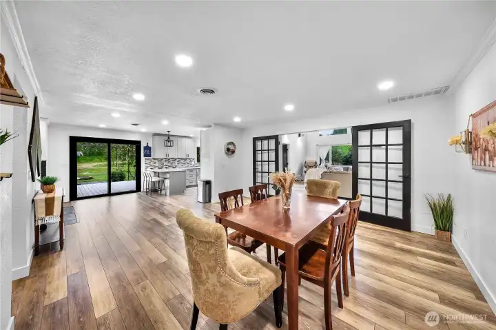 Beautiful dining space opens into main living space through french doors, open them or close them whatever your preference is for comfort