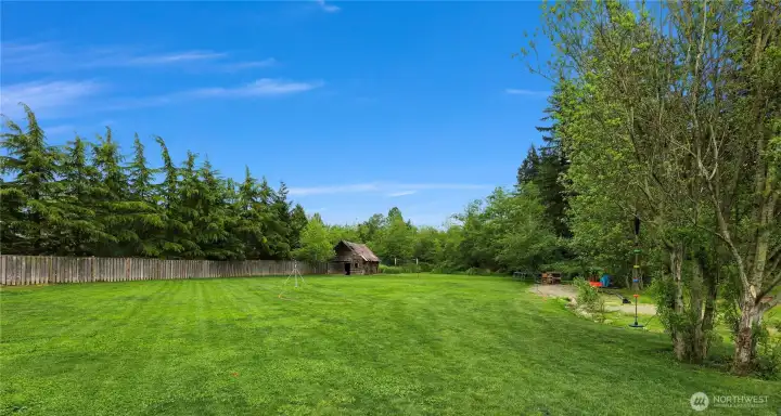 Back of pasture features original barn to property, fully functioning chicken coop!