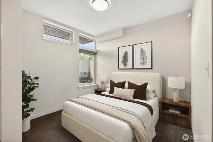 Bedroom with natural light and corner windows (virtually staged)