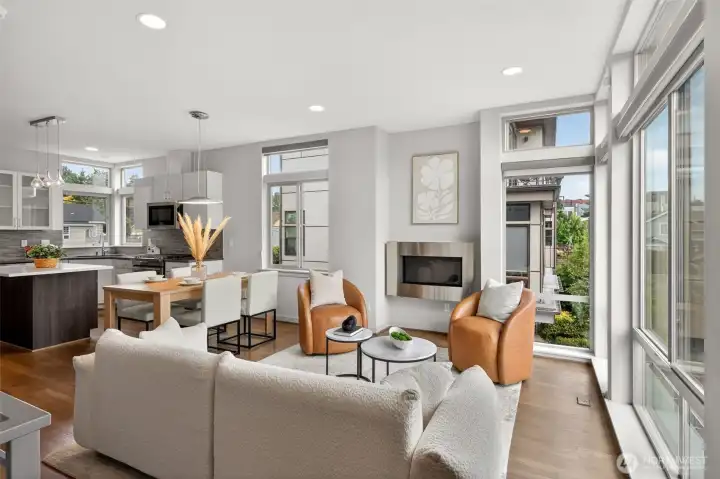 Living room with gas fireplace and floor-to-ceiling windows