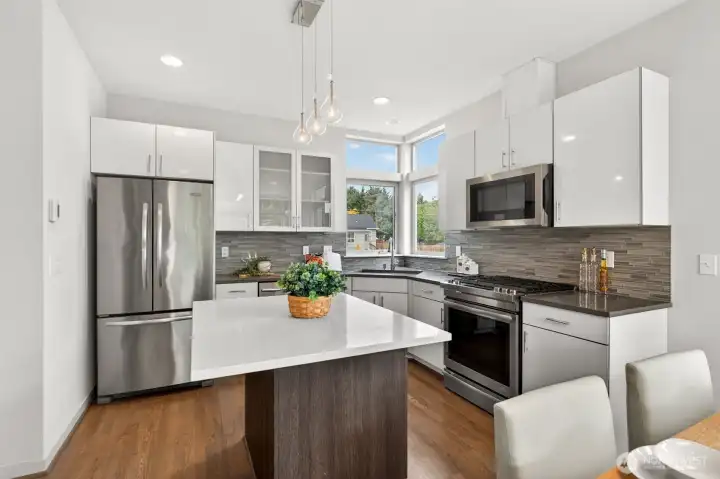 Kitchen with full appliance suite and abundant cabinet storage