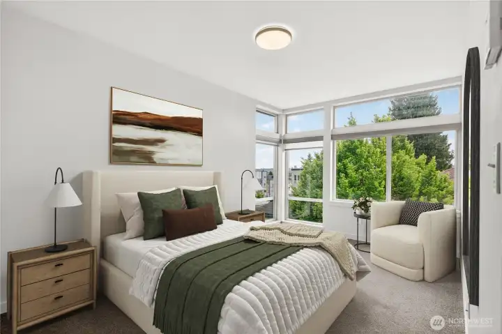 Primary suite with corner windows and en suite bath (virtually staged)