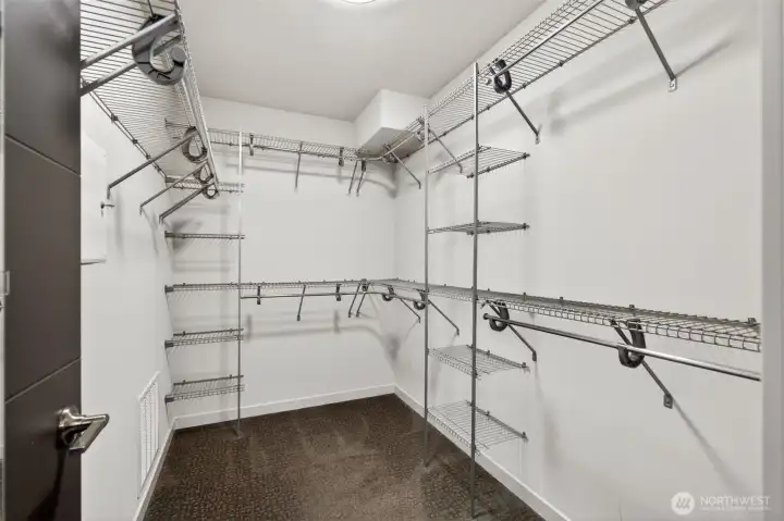 Oversized Walk-in closet with built-in shelving system