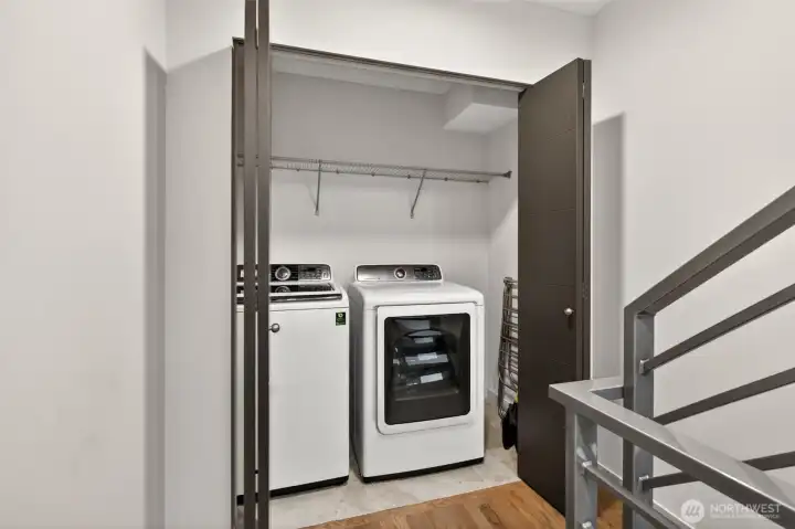 Full-size washer and dryer on primary bedroom level