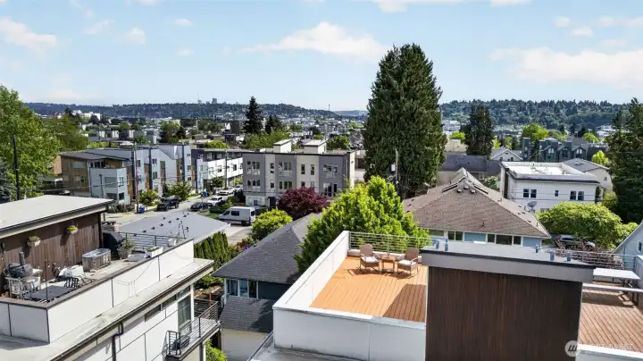 Aerial view of home within the neighborhood context