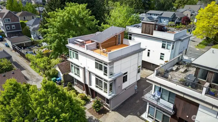 Aerial showing rooftop and neighboring buildings