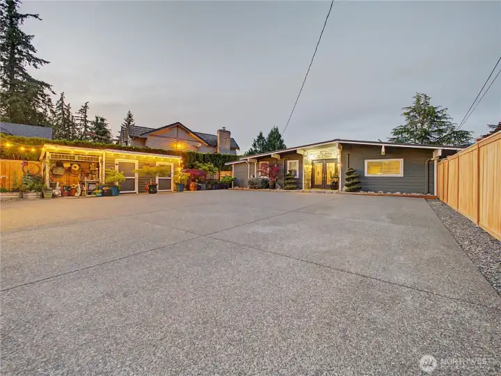 Rarely do you find a property that combines such meticulous upkeep with outstanding functionality. The detached garage, garden shed, and expansive driveway offer ample room for vehicles, toys, and all your lake-life essentials.