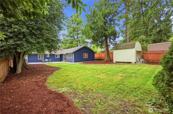 The lovely property sits on a private 8,205 square foot lot. There's plenty of space for playing, doggie fun or  gardening. There's also a large detached storage shed for your storage needs.