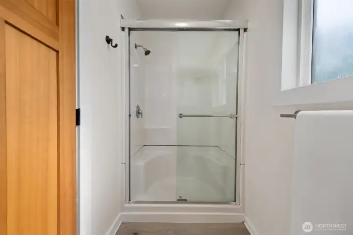 New shower, in-floor heat in bathroom, ceiling fan and light.