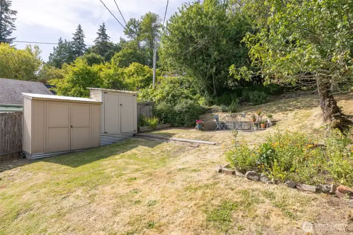 Both storage sheds are included