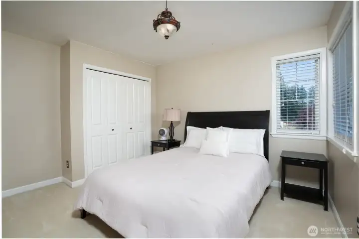 Secondary bedroom with lots of space for guests, kids, an exercise room, gaming room, or whatever your creative mind can come up with.