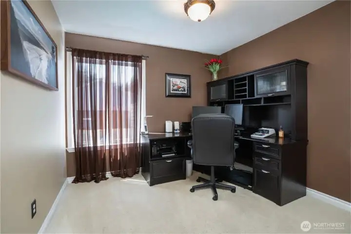 Whether you work from home, need a gaming space, or need a main floor "bedroom" (no closet) this room is very utilitarian.