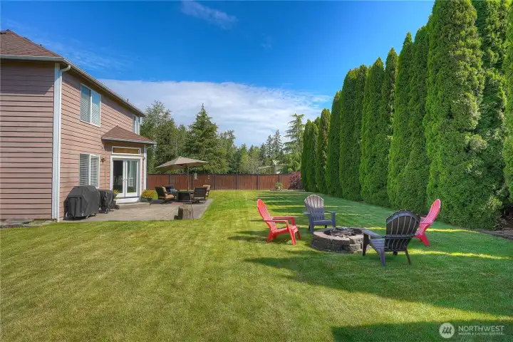 Very private back yard that is fully fenced. There is a firepit and a shed for storing your lawn equipment. If you love yard work and putting you touch on your own yard, this is the home for you. If you do not love to do yard work, there are multiple lawn companies that service the neighborhood so you can watch someone else mow the grass.