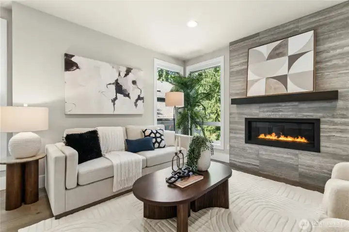 Floor to ceiling windows let an abundance of natural light into the home. Floor to ceiling windows let an abundance of natural light into the home.
