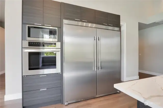 Convection Stainless Steel Oven • Convection Microwave • Full Height Tile Backsplash