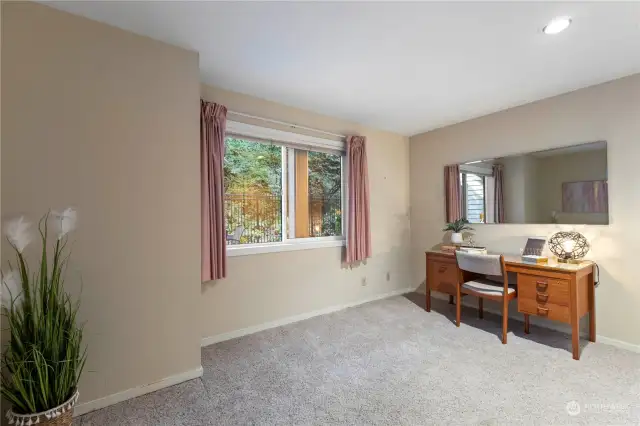 Good size 2nd bedroom looks out to the courtyard