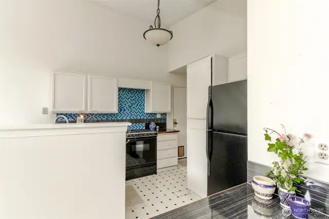 Kitchen is open to the living room or close the louvered doors and it can be private