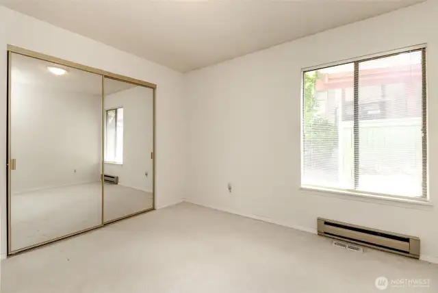 2nd bedroom with a wall of closet