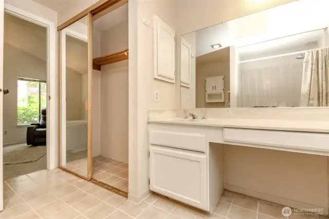 There are two closets for the primary bedroom and one is in the primary bathroom