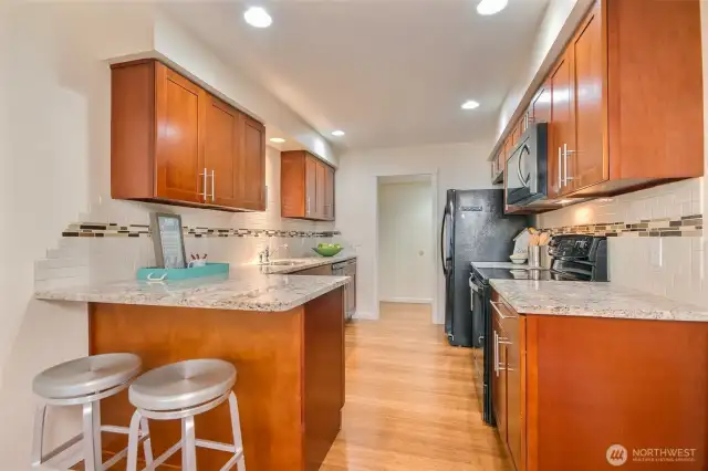 Kitchen has eating bar