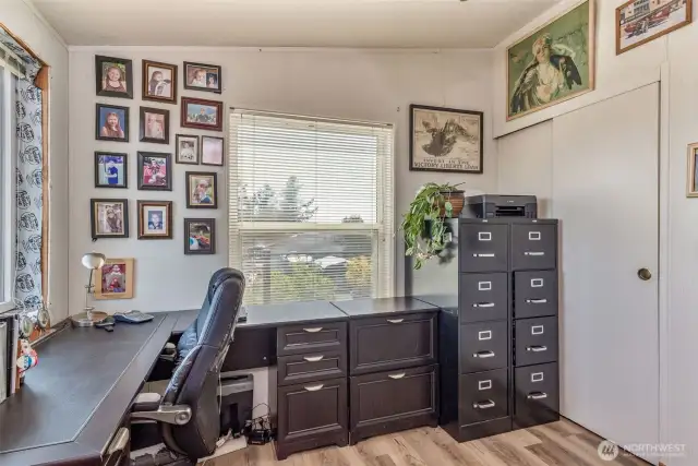 Den/office has closet for flexible use
