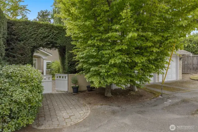A charming home and amazing property wait for you behind this hedge!
