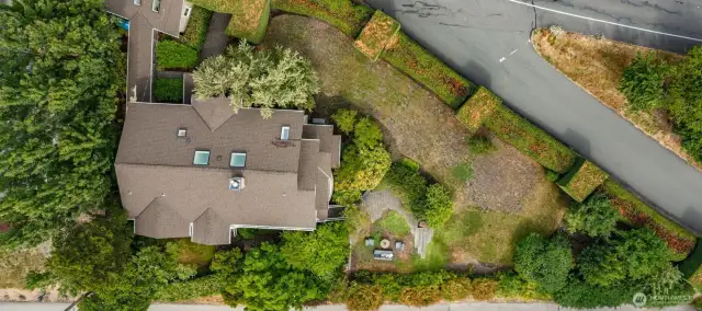 Amazing property! This aerial view shows the expansive yard for play, gardening and entertaining.