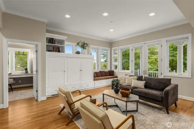 Large Family room with french doors out to that great covered porch