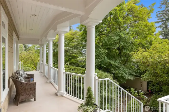 Love this covered porch!  Think morning coffee, evening sunsets, reading a book rain or shine....