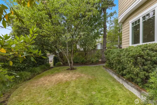 Nice yard and garden on all sides of the house.