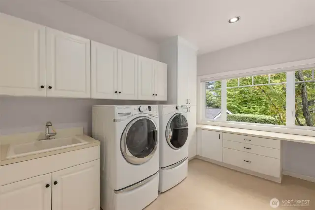 What a happy laundry room -- and look at all the storage!