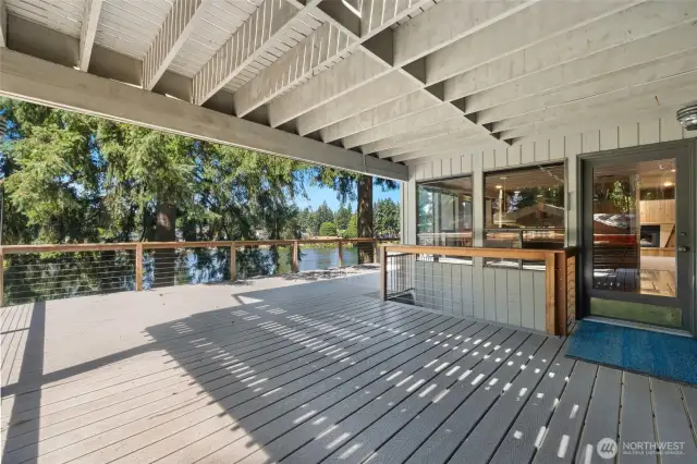 Covered deck off dining room separate door to  kitchen