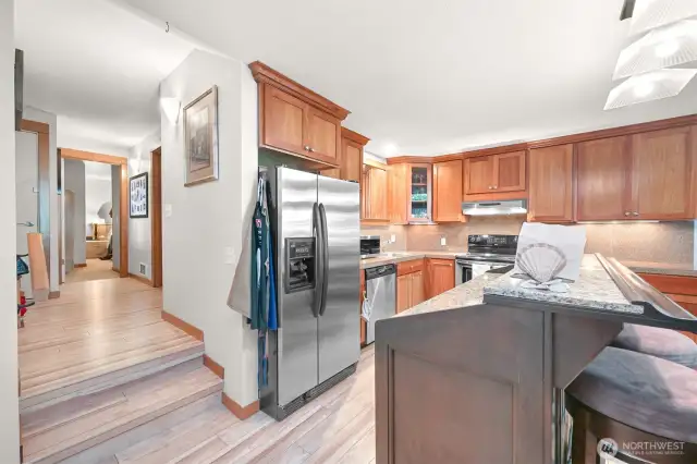 Up 2 stairs to bedrooms, bathroom & laundry