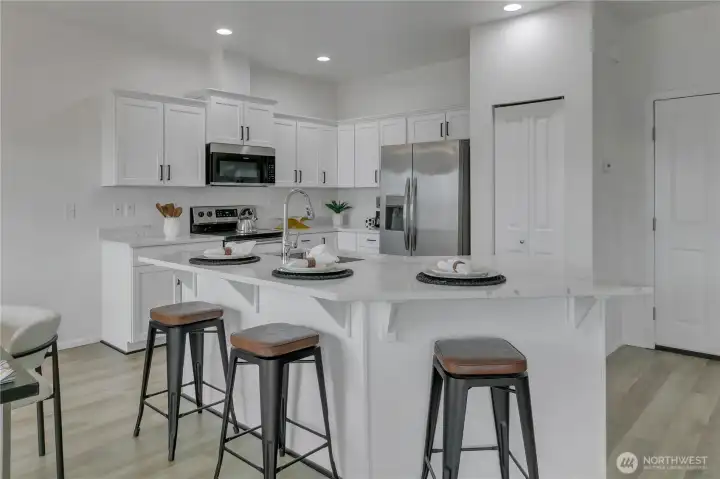 Open Kitchen with Island and updated countertops