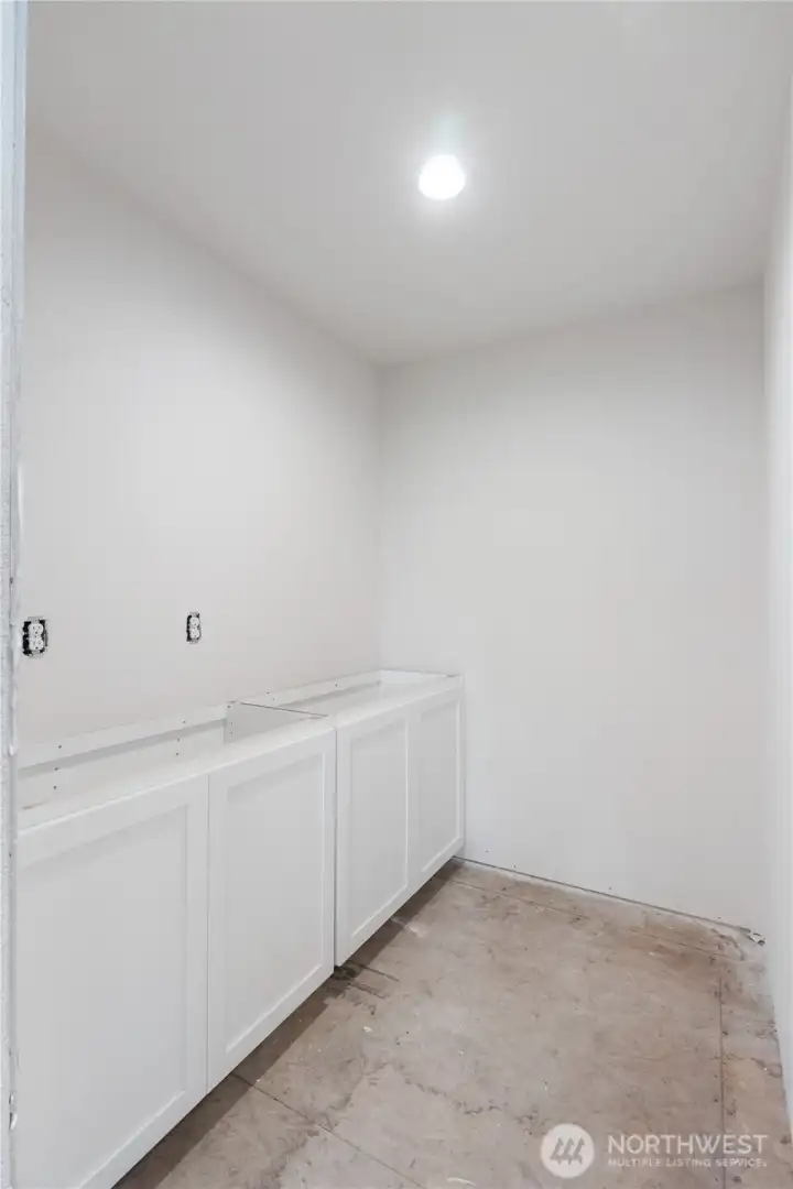 Massive walk in pantry with lower cabinets! Quartz counter tops going in soon.