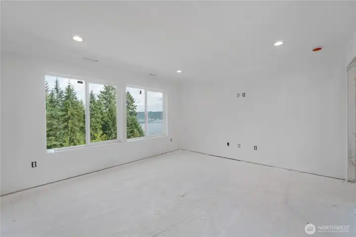 Primary bedroom on the main floor.  Can lights & AV tubing installed.