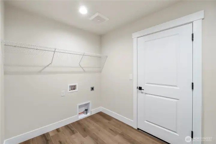 Oversized utility room off the garage.