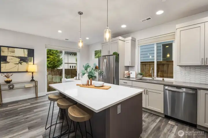 Slider out to the patio and wraparound yard.