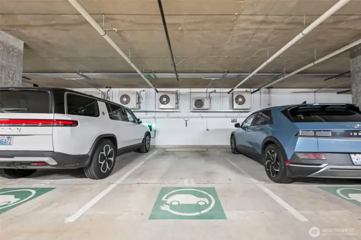 This home comes with two reserved parking spots, one is EV (240v)! Conveniently located on the main level (2nd floor) of the parking garage.