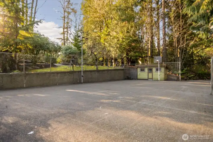 Sports court and multiple outbuildings