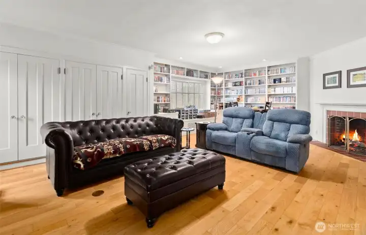 Large den glorious windows and built in cabinetry (could be main level bedroom)