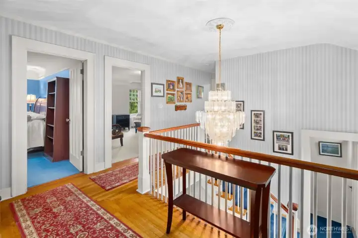 Attractive landing overlooks the entryway