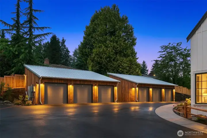 Garages are detached and clustered to the side of the community, just a few steps from the home.  Clad in priceless, hand split cedar siding, salvaged from St. George church, which previously stood on the property.