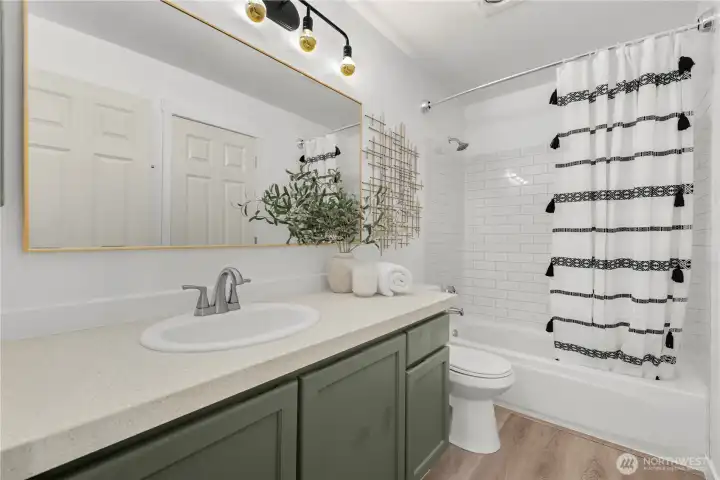 Guest Bathroom with dual doors to hall & bedroom