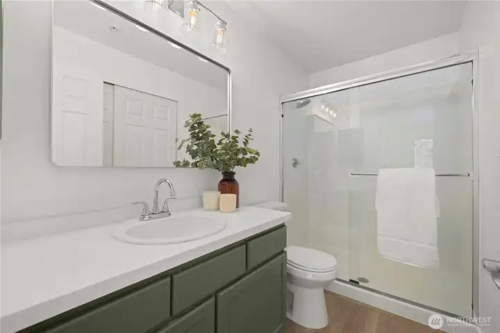 En-sute primary bathroom with stylish updates