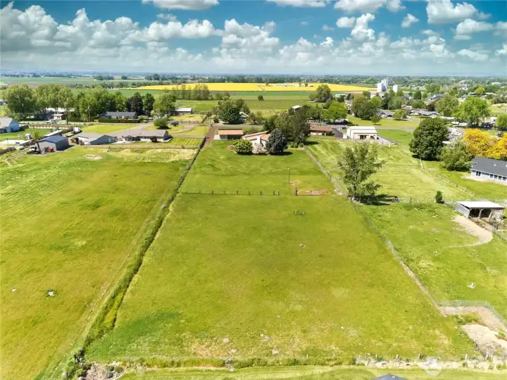 2 acres of partially fenced pasture