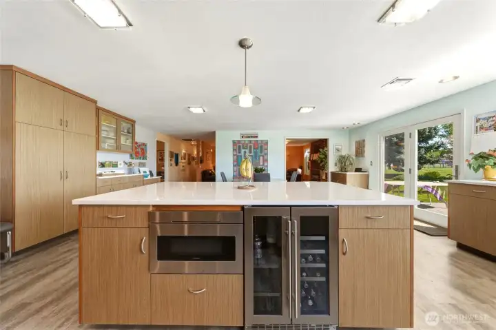 Island with beverage fridge and microwave