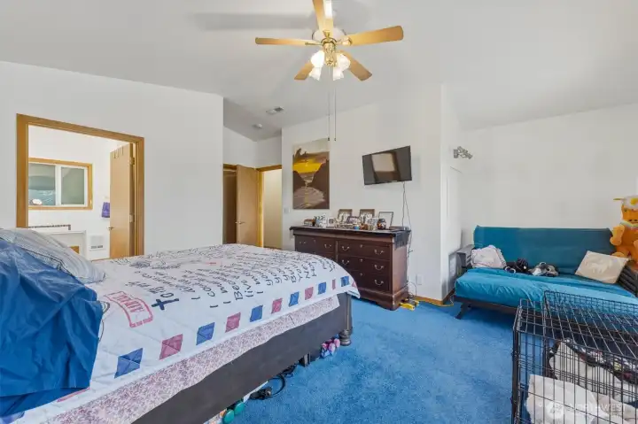 Primary bedroom with large bath and walk in closet